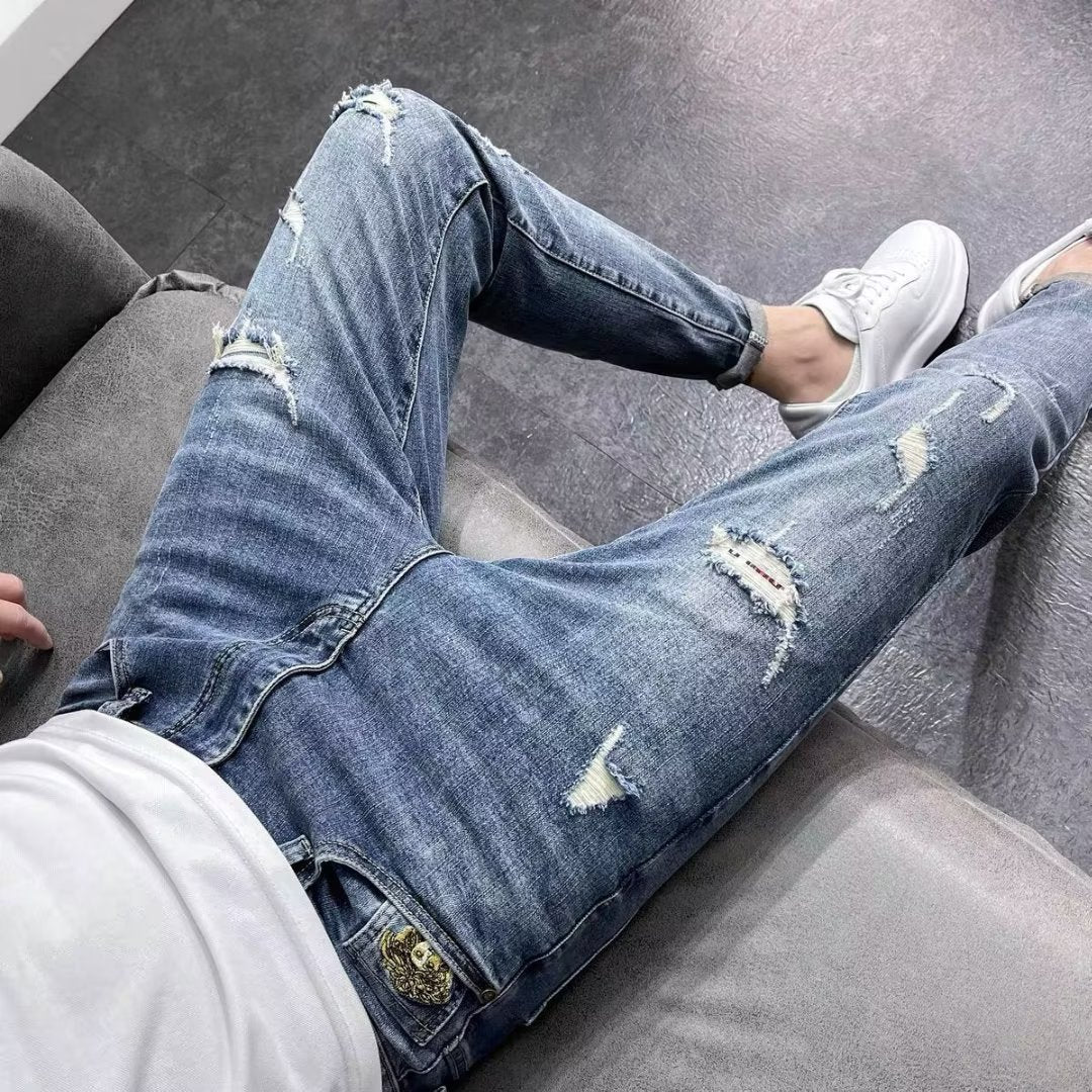 TB Mix Frühling und Herbst neue Herrenmode zerrissene Jeans Skinny Pants Trendy Brand Pants Frühling und Herbst dünn